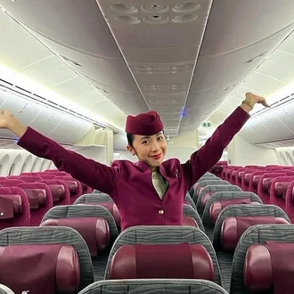 Elisa in her flight attendant uniform